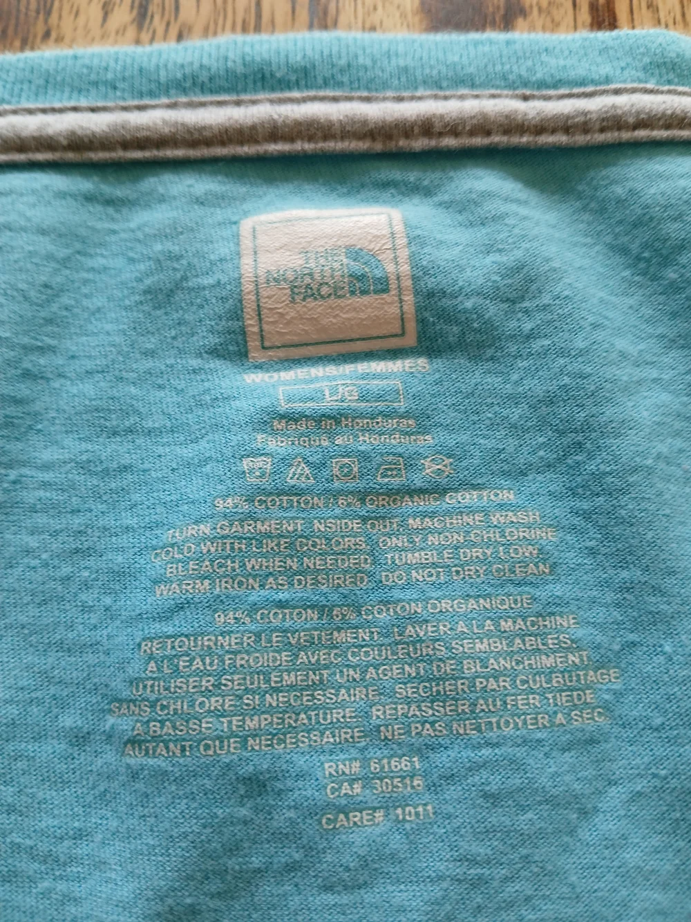 The North Face Women’s V-Neck Tee in Aqua with Multicolor Logo - Picture 3 of 7